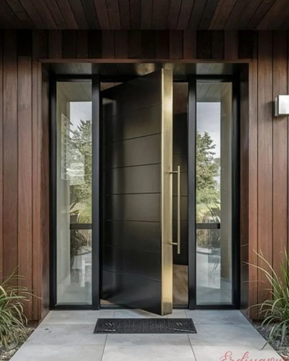 Anthracite Pivot Door with Gold Handle on a Wood Facade — product code BY-344
