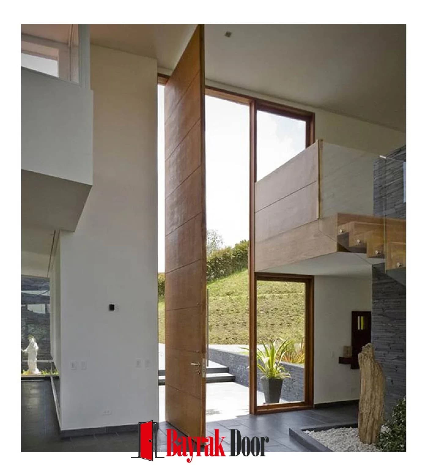 Plain Walnut Pivot Steel Door TR302 — Full-height walnut pivot leaf beside floor-to-ceiling fixed glazing