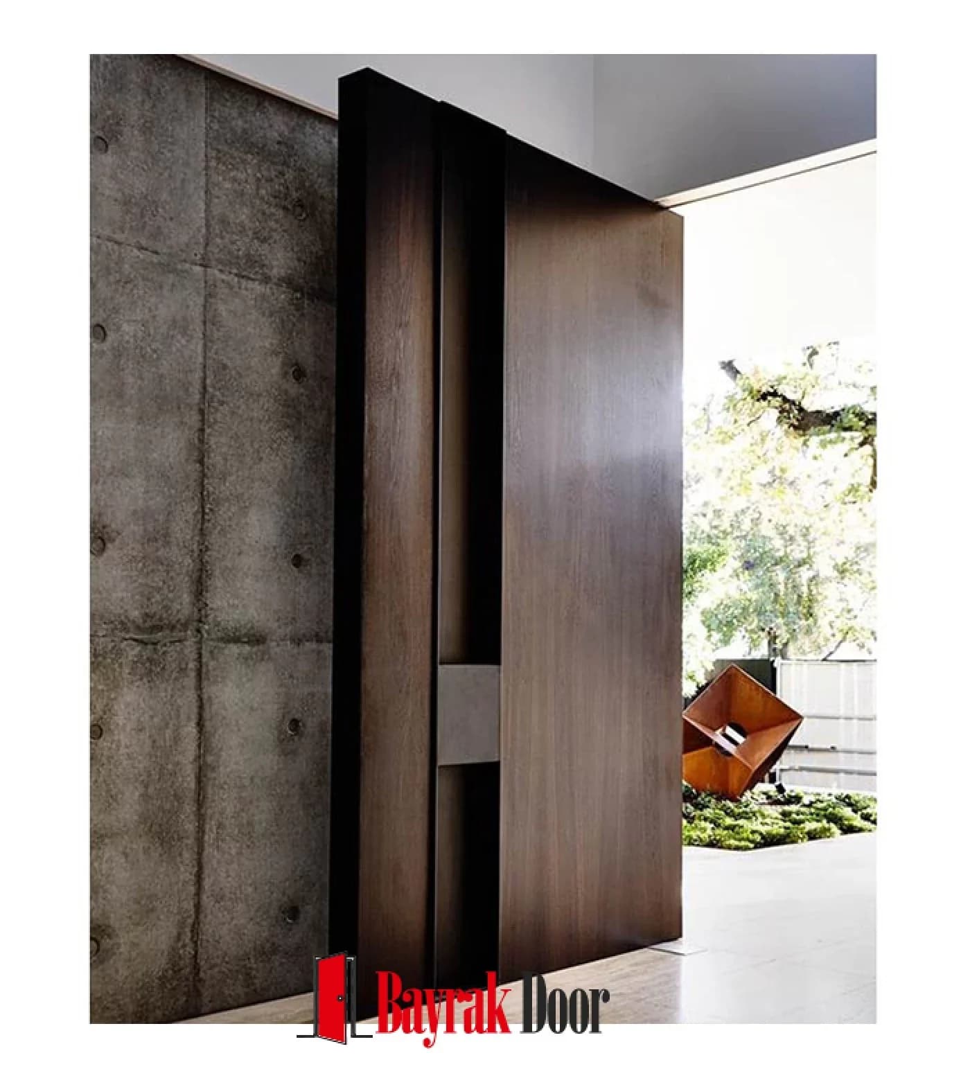 Plain Dark Walnut Pivot Steel Door TR332 — Dark walnut pivot in front of a concrete facade, with a vertical slot handle dividing the leaf