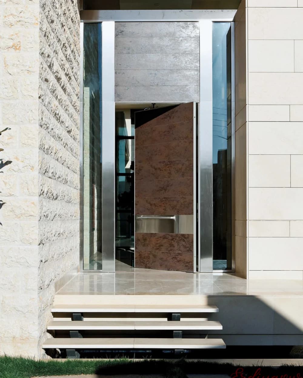 Tall-Leaf Red Walnut Pivot Door in a Narrow Entryway — product code BY-81