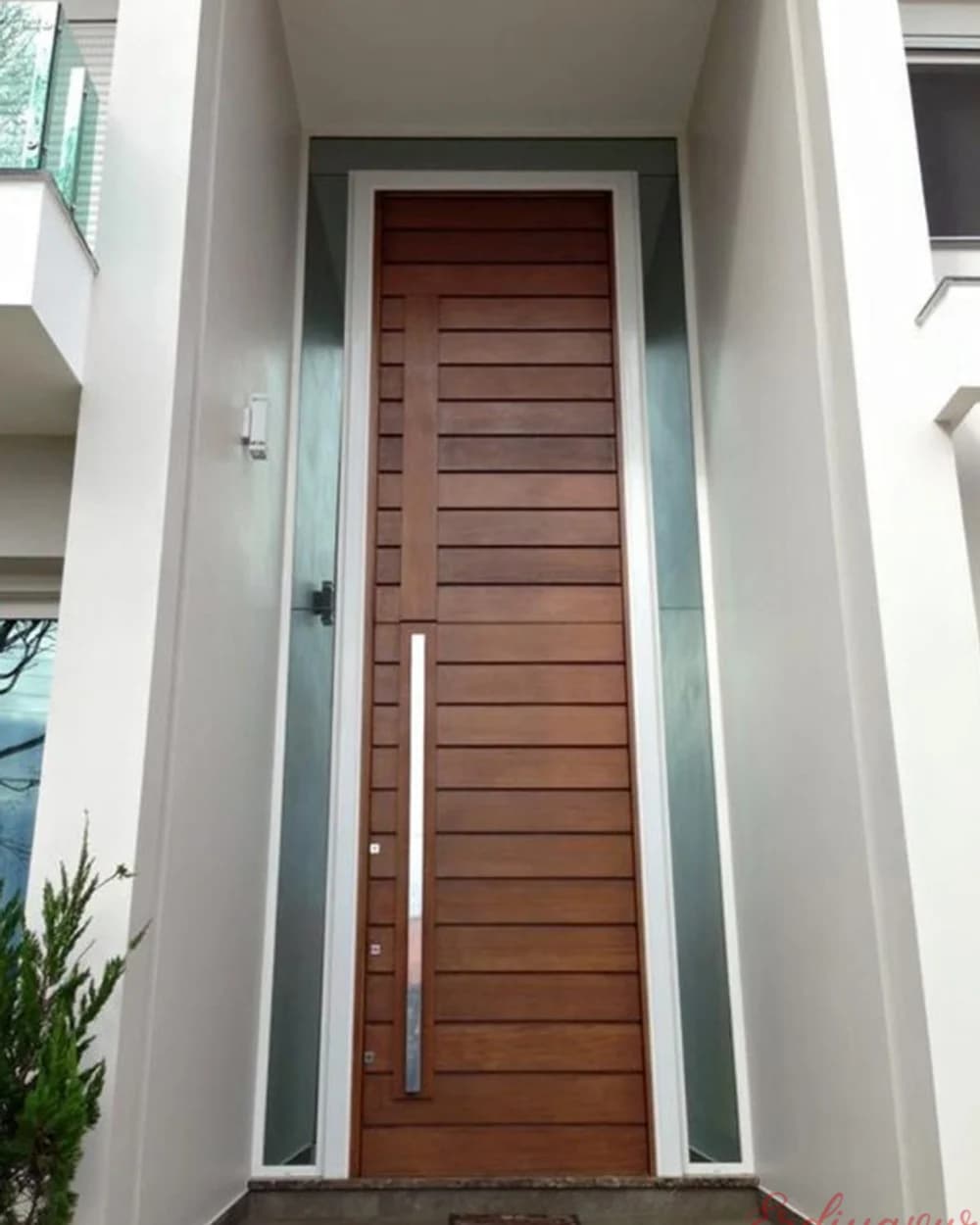 Tall Honey-Toned Pivot Door with Narrow Glass Strip — product code BY-184