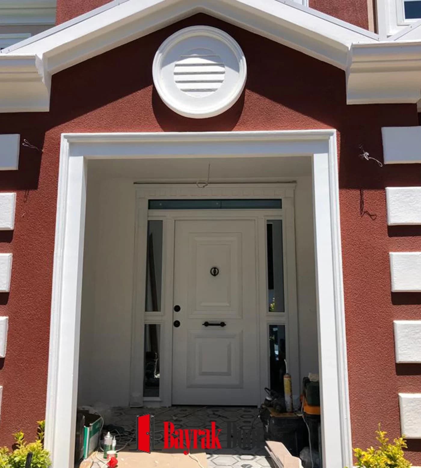 Paneled Off-White Villa Door BD-TR86 — Off-white paneled leaf on a villa with a red facade