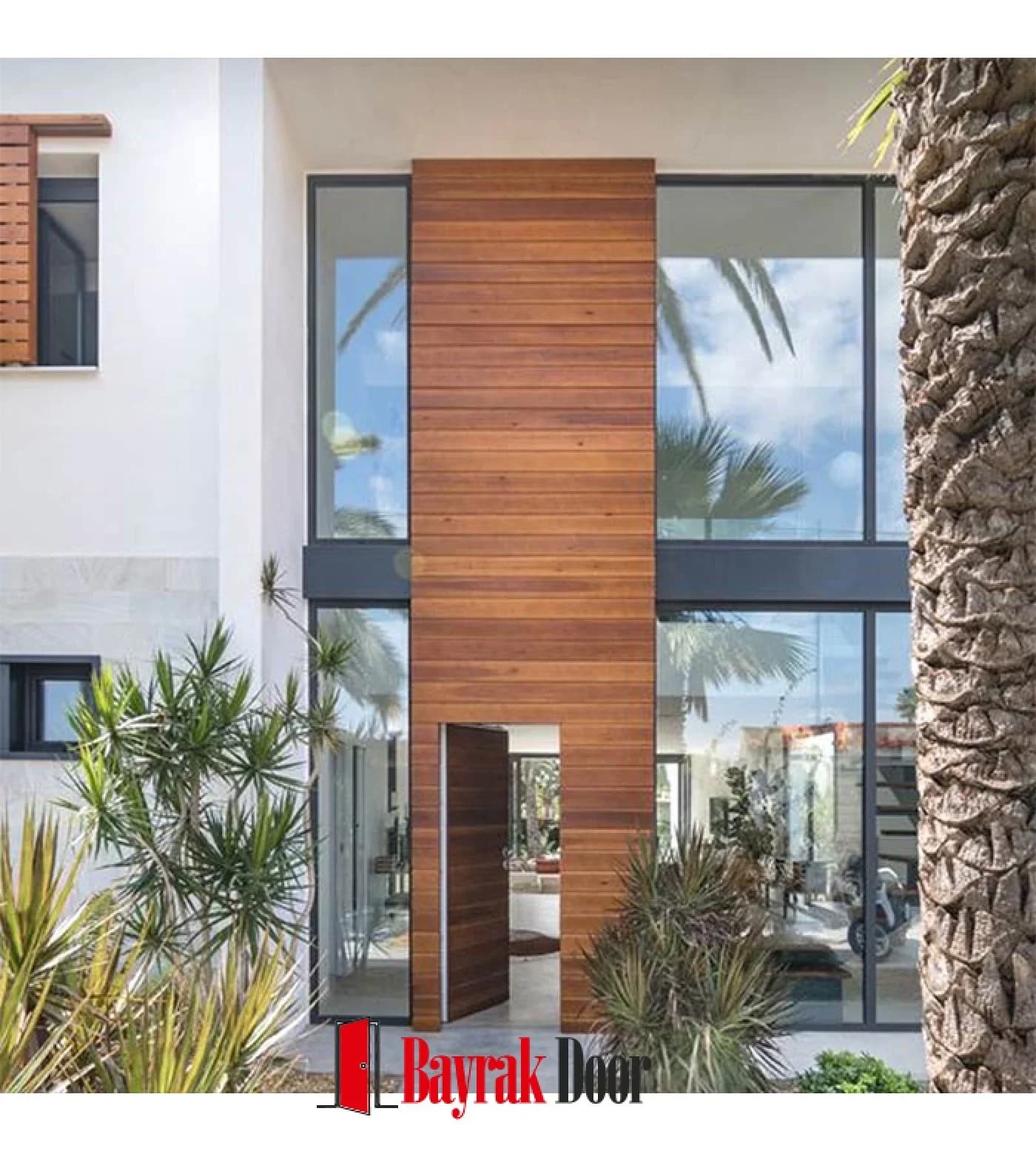 Vertical Slat Dark Walnut Pivot Steel Door TR303 — Dark walnut pivot leaf with vertical slats running two stories high