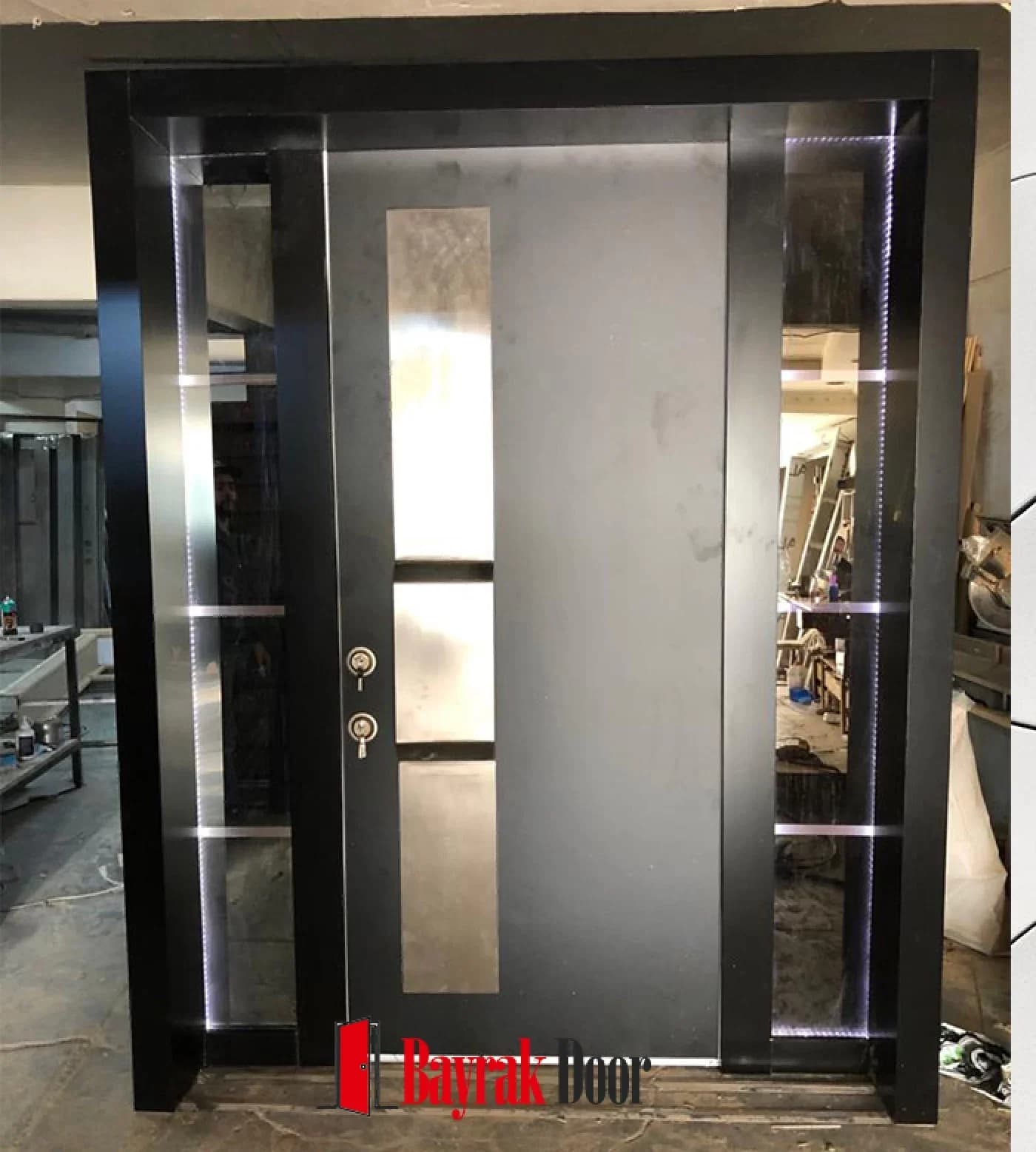 Wide Stainless Steel Black Villa Door BD-TR98 — Wide stainless steel vertical plate dividing a black body, with LED-lit sidelights