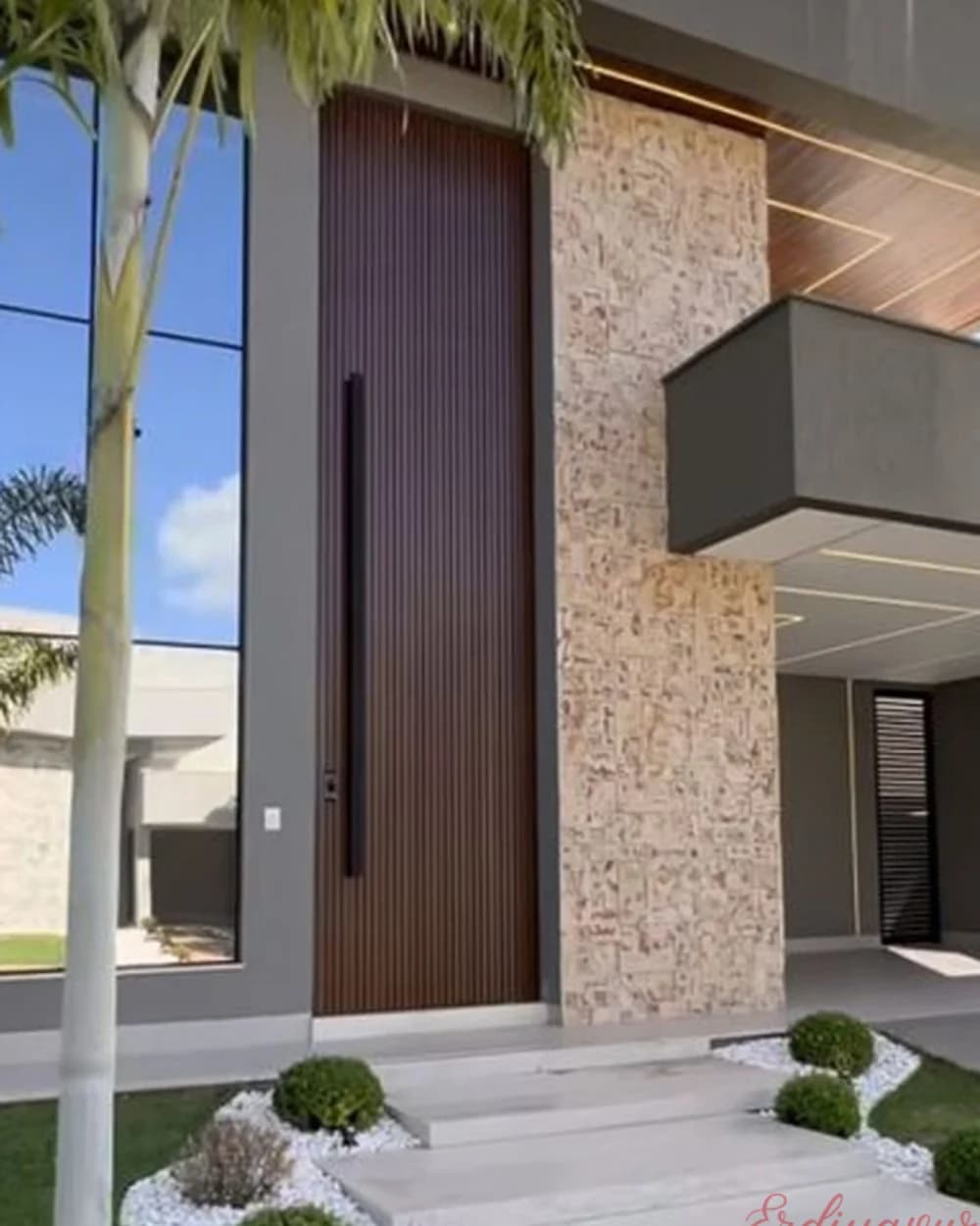 Dark Walnut Pivot Door for Stone-Clad Entrances BY-193 Dark Walnut Pivot Door in a Stone-Clad Entrance — product code BY-193